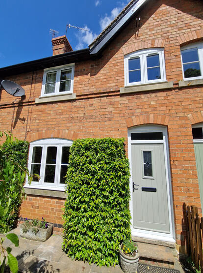 Brick house with white windows
